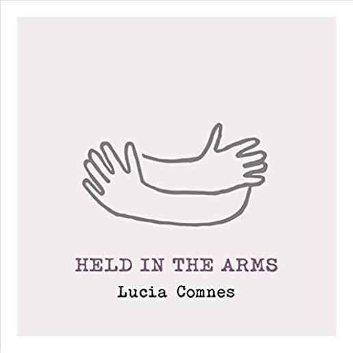 HELD IN THE ARMS